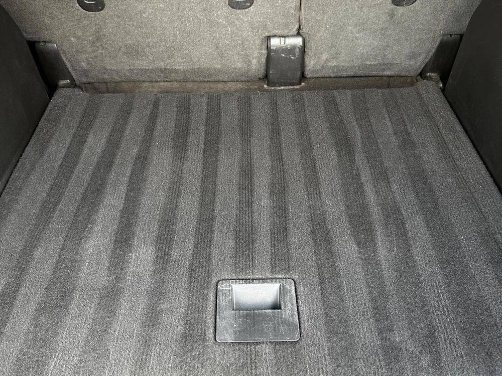 Cargo carpet with fresh vacuum lines after hot water extraction